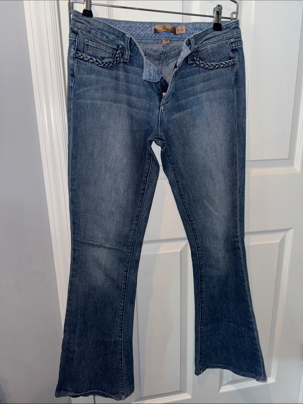 Paige Flared Jeans in Faded Blue Denim
